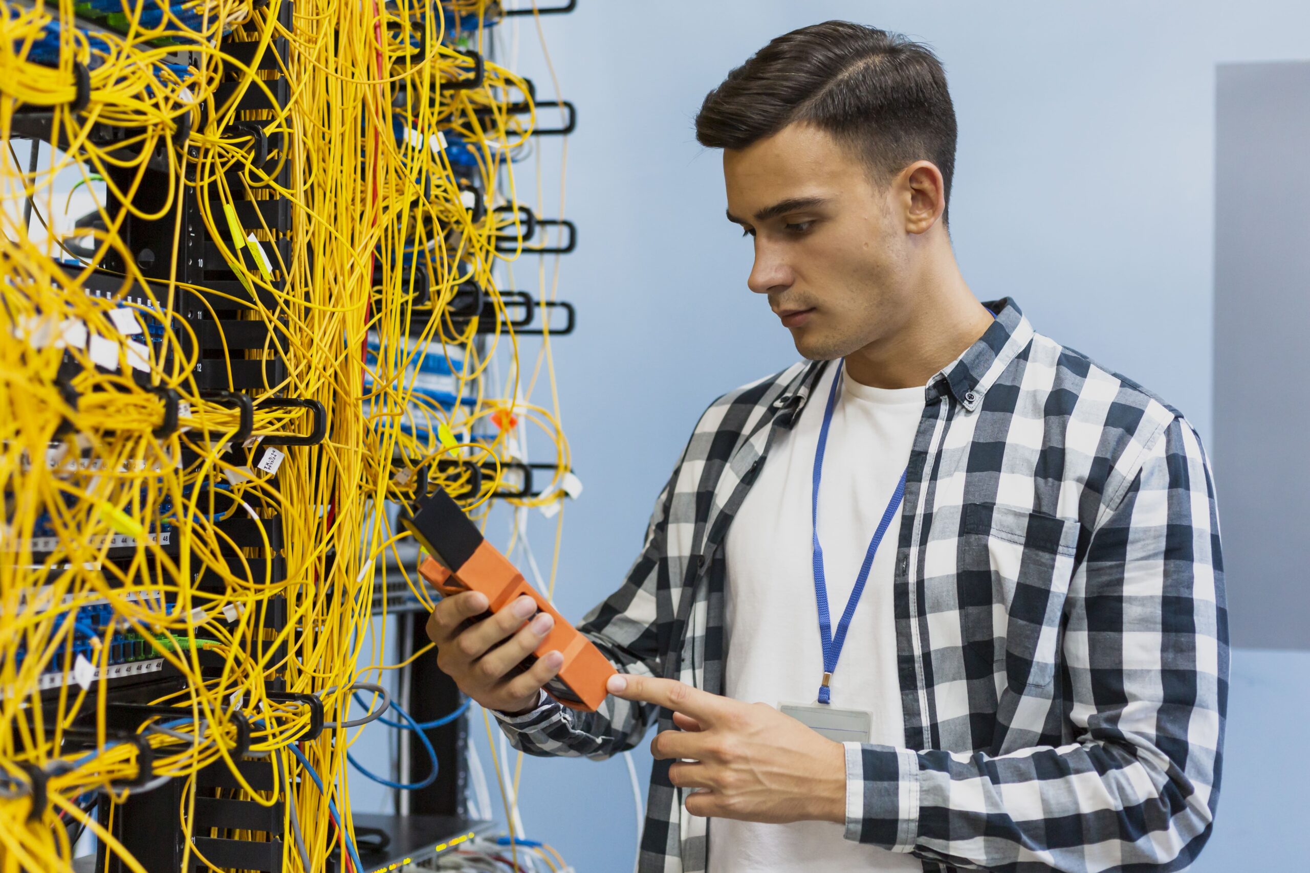 Young Man Looking Fiber Optic